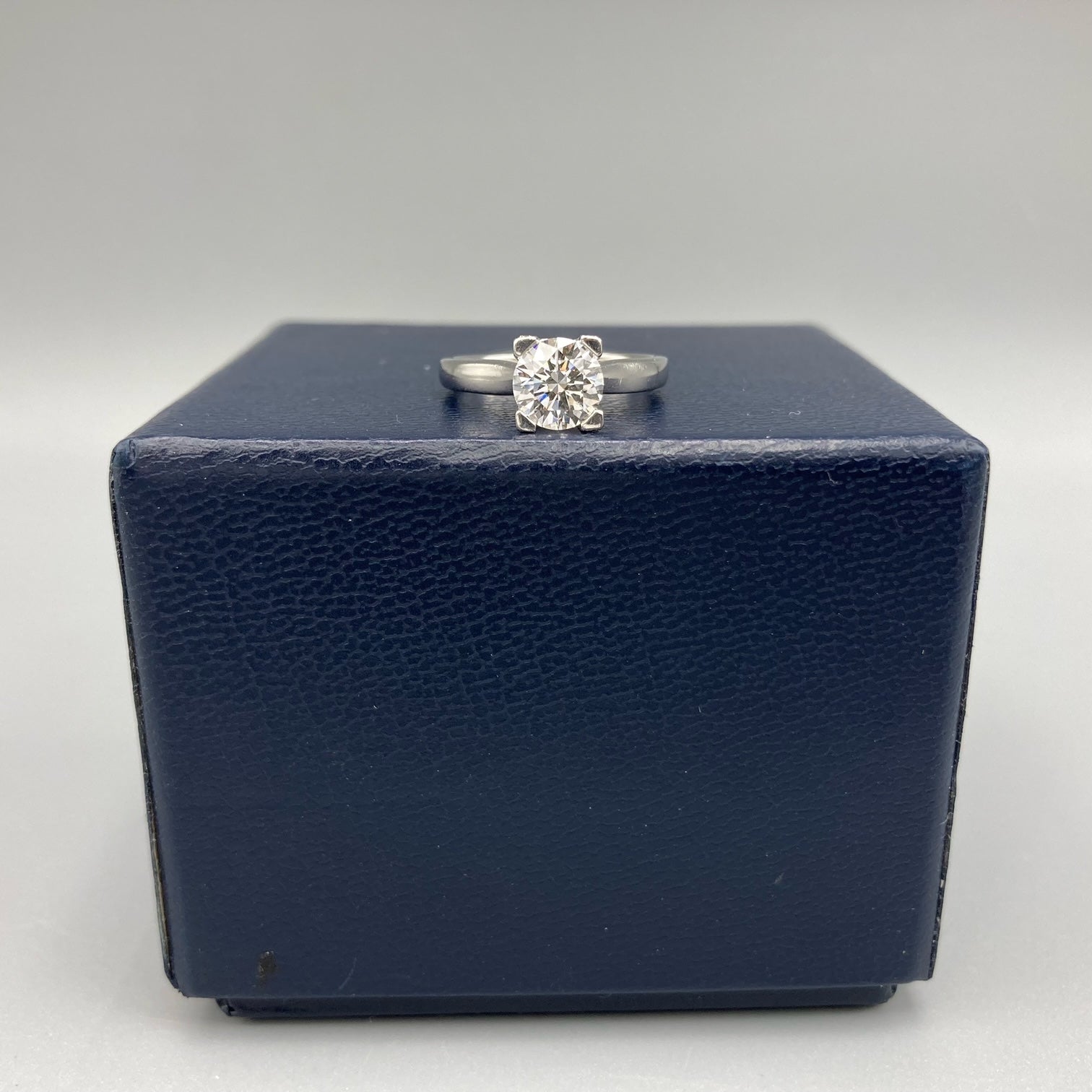 Harry Winston 1.10 Carat E-VVS2 Center Stone Solitaire HW Diamond Logo Round Brilliant Platinum Engagement Ring