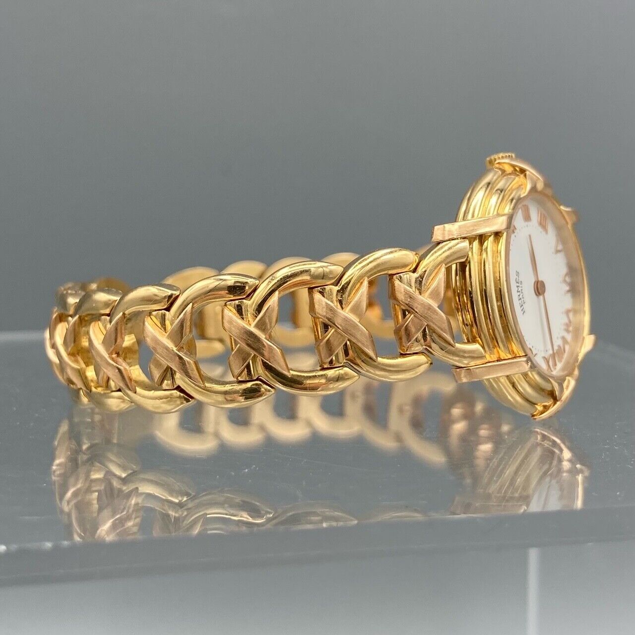 Montre ruban Hermes en or jaune et rose 18 carats – Montreal Pawn