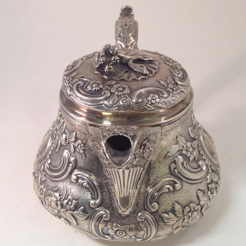 Antique Georgian Sterling Silver Repose Tea Pot with Embossed Floral Patterns