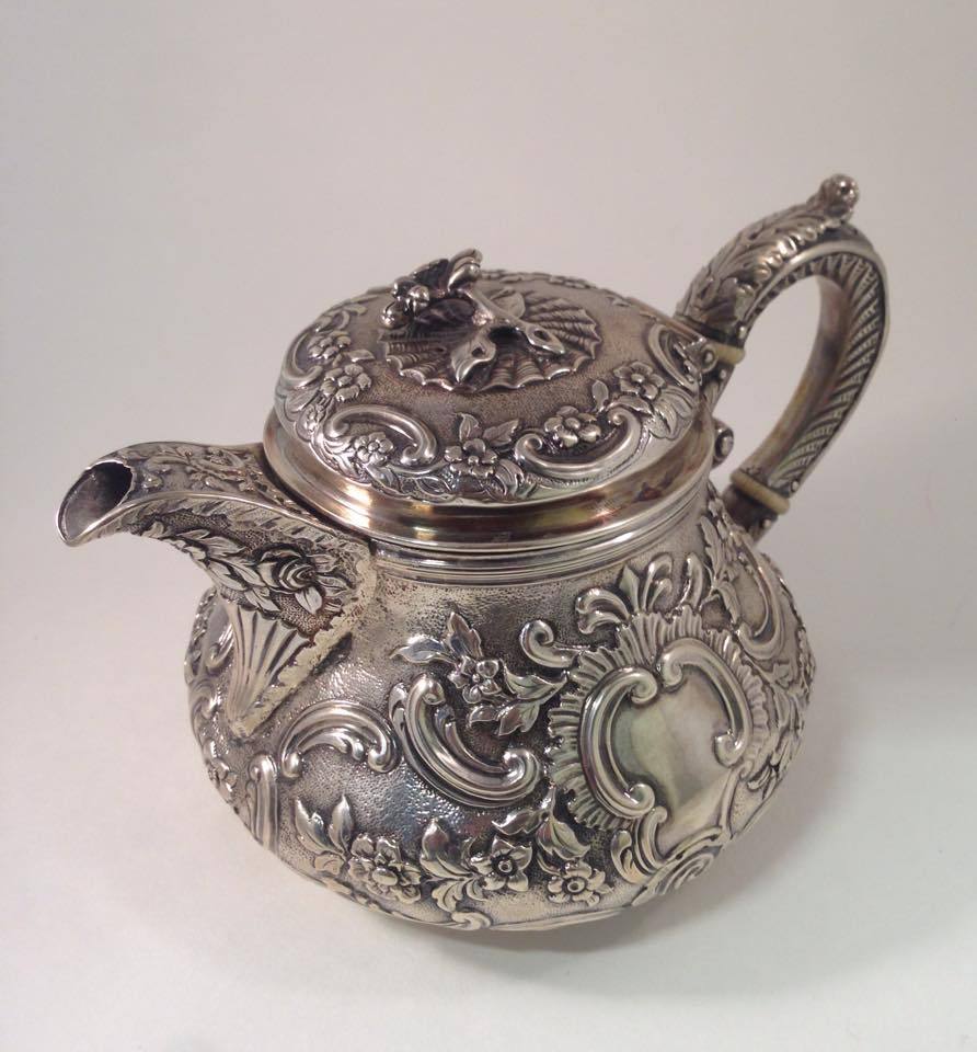 Antique Georgian Sterling Silver Repose Tea Pot with Embossed Floral Patterns