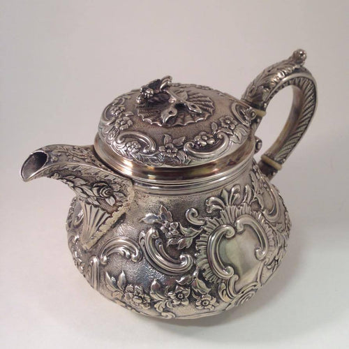 Antique Georgian Sterling Silver Repose Tea Pot with Embossed Floral Patterns