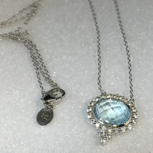 Blue Topaz and White Sapphire Halo Pendant