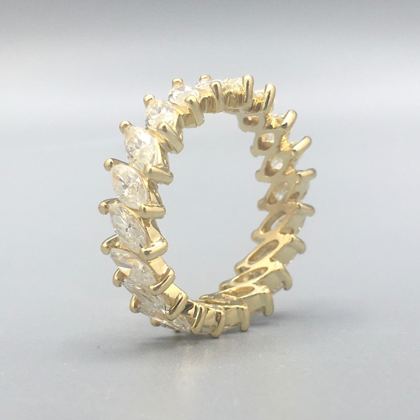 Marquise Cut Diamond Eternity Band with 20 diamonds set in 18k yellow gold
